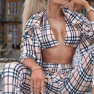 Women’s cross, print, tan black, and red outfit